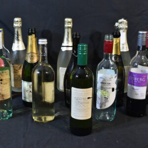 Champagne, carva, wine bottles.