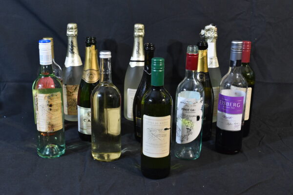 Champagne, carva, wine bottles.