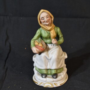 Sitting lady ornament