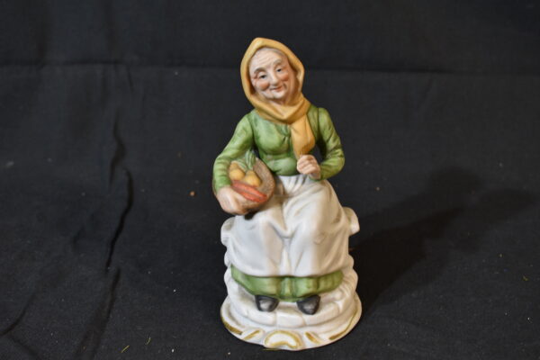 Sitting lady ornament