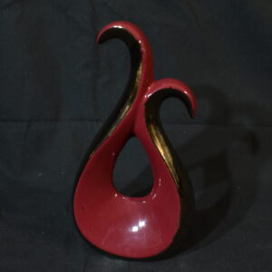 Red curvey ornament