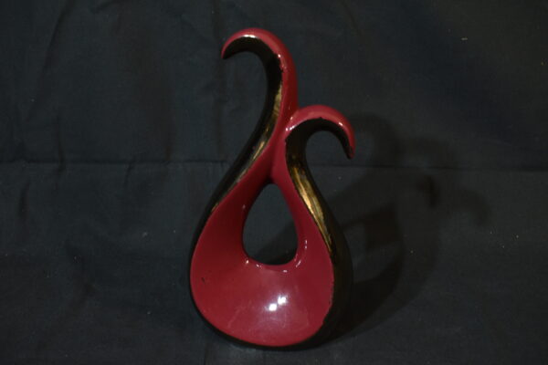 Red curvey ornament