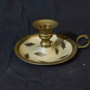 Brass saucer candle holder with finger hole handle