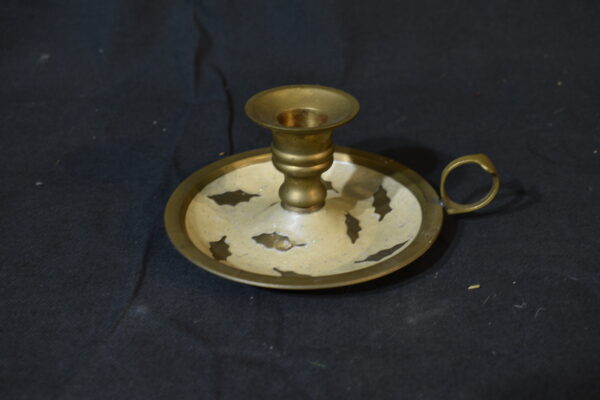 Brass saucer candle holder with finger hole handle
