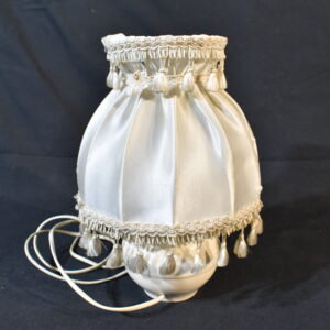 Lamp with tassels