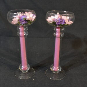 Pair of glass candle holders with flowers
