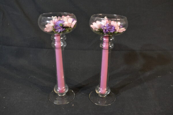 Pair of glass candle holders with flowers