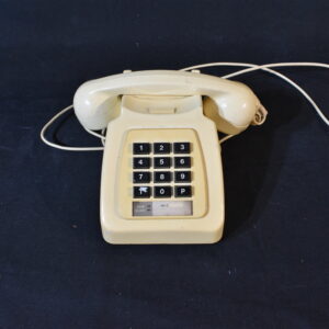 Cream desk phone