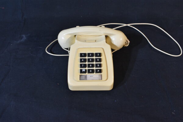 Cream desk phone