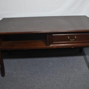 Dark wood coffee table with drawer
