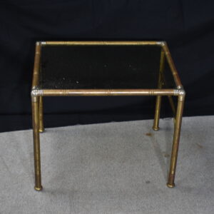 Small brass end table with glass top