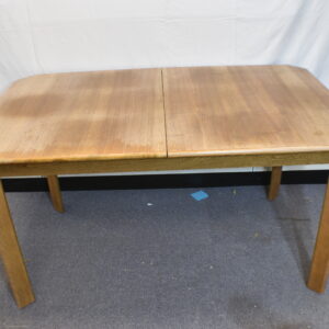 Large extending wooden dining table