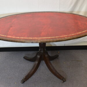 Large red round dining table