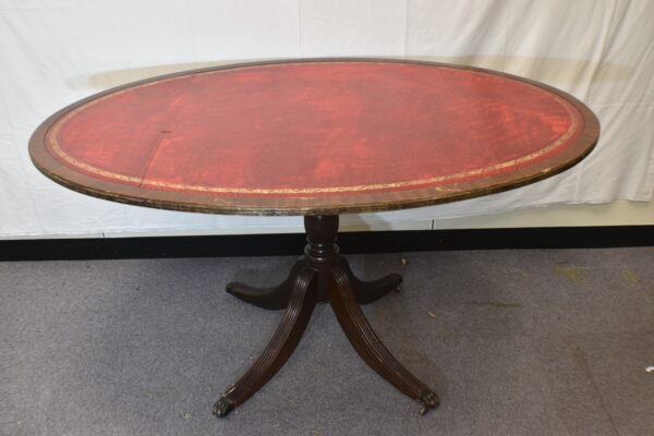Large red round dining table